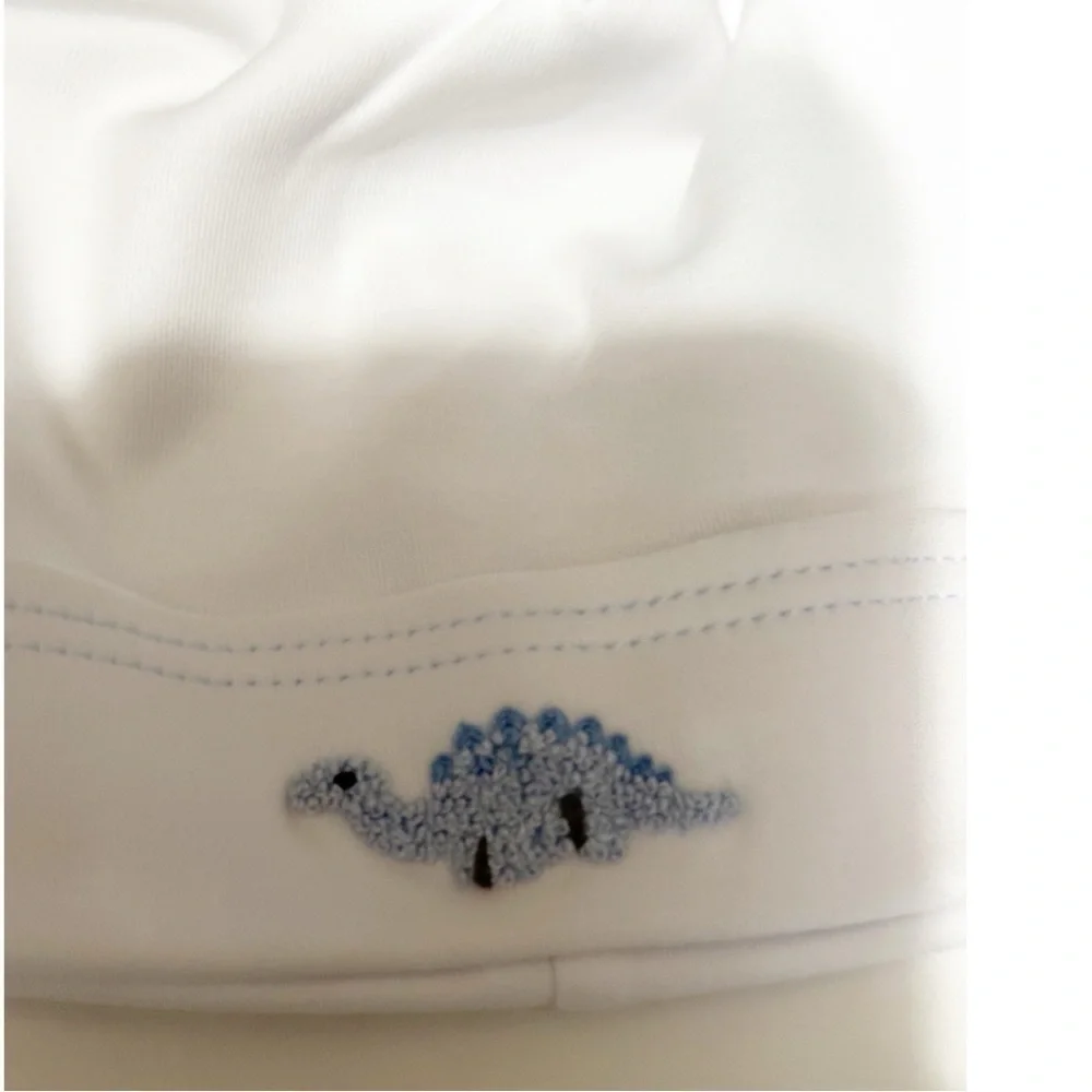 Magnolia baby white Pima cotton baby hat, Tap dinosaur. NWT